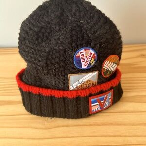 Louis Vuitton knitted hat with patches